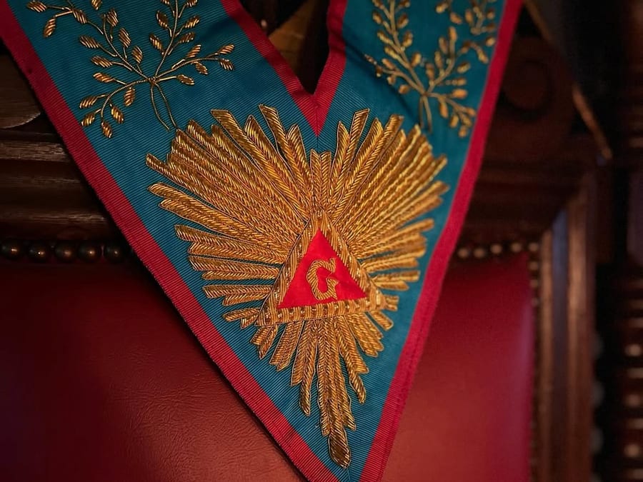 A Past Master’s collar and jewel belonging to the Lodge.
